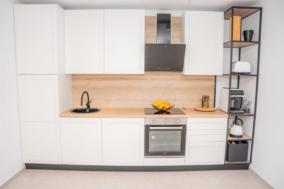 Kitchen or kitchenette, oven, stove