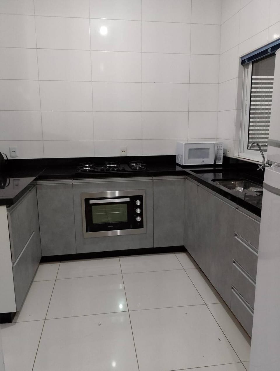 Kitchen or kitchenette, microwave, oven, stove, kitchen