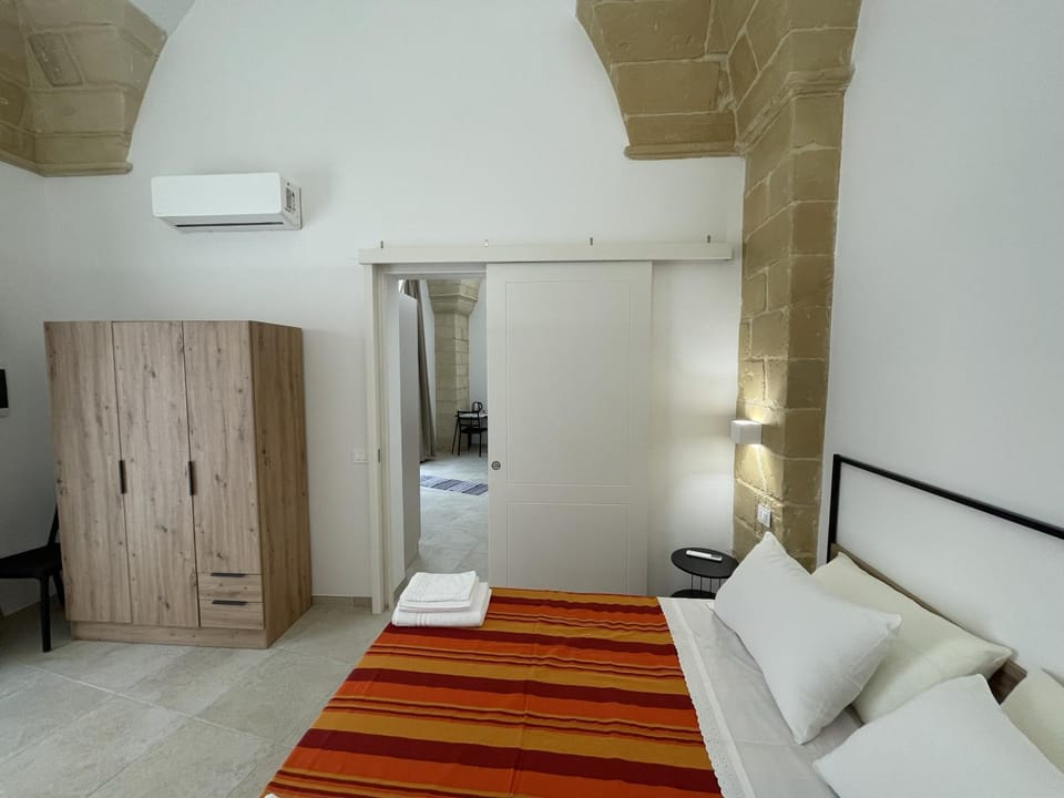 Photo of the whole room, Bedroom, towels, air conditioner