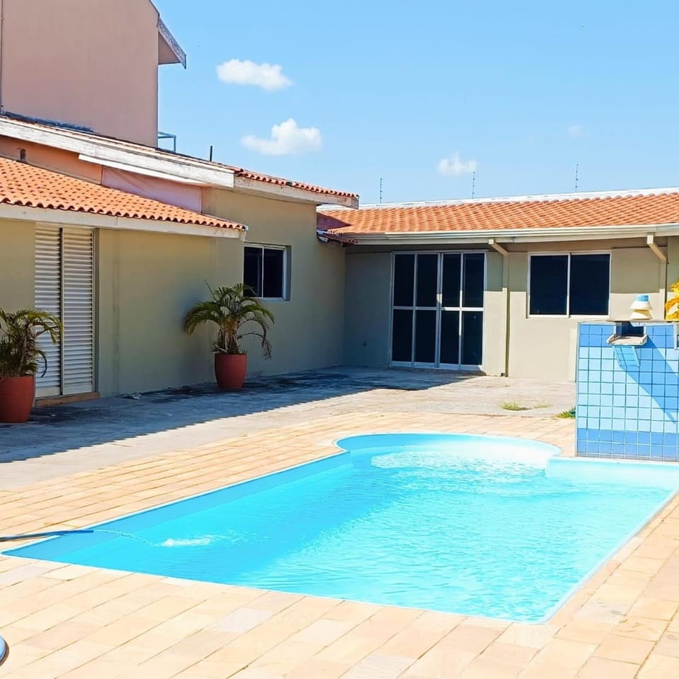 Property building, Day, Pool view, Swimming pool