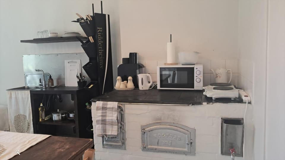 Kitchen or kitchenette, stove