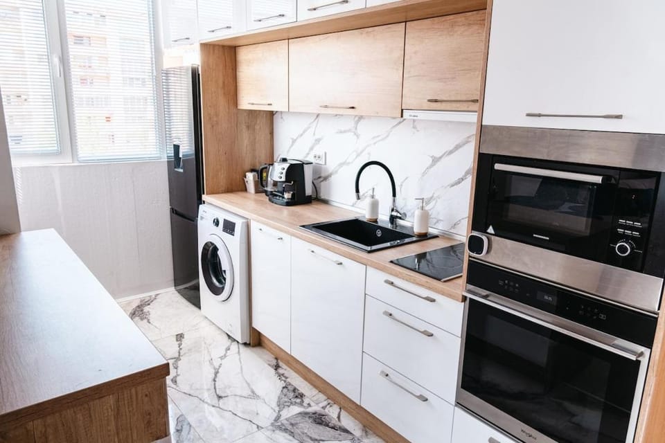 Coffee/tea facilities, Kitchen or kitchenette, dishwasher, minibar, oven, stove, toaster, washing machine, dryer