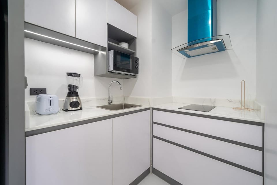 Kitchen or kitchenette, stove, toaster