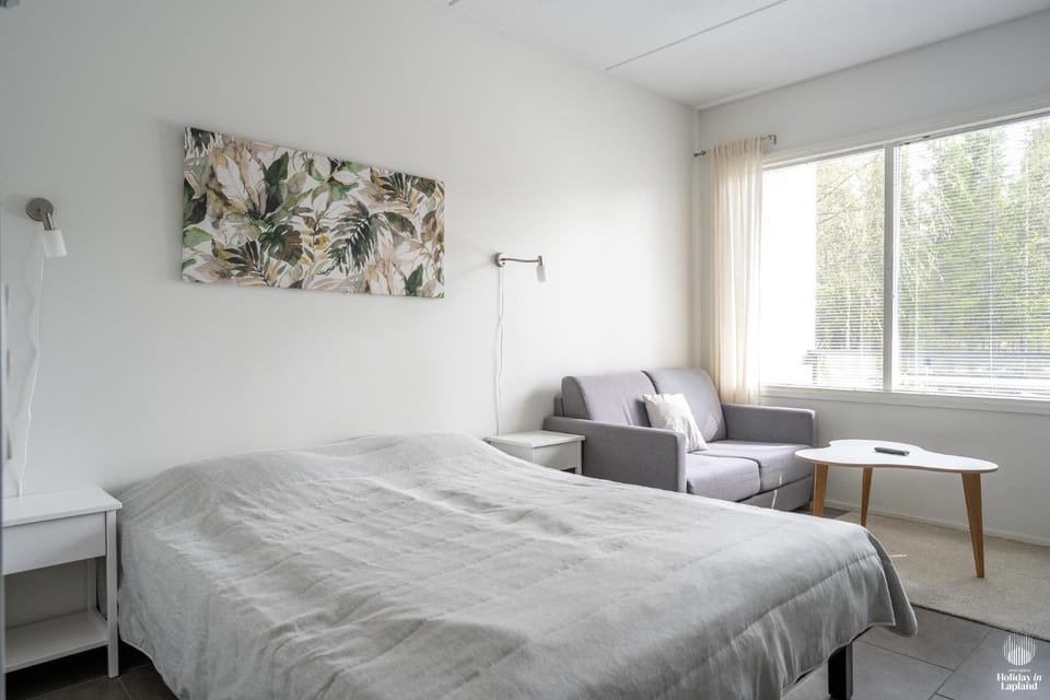 Bed, Living room, Seating area, Bedroom