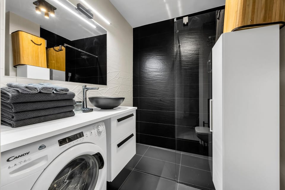 Kitchen or kitchenette, towels, washing machine