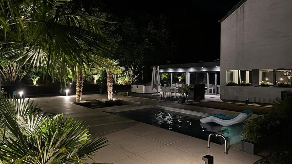 Patio, Night, Pool view, Swimming pool, sunbed