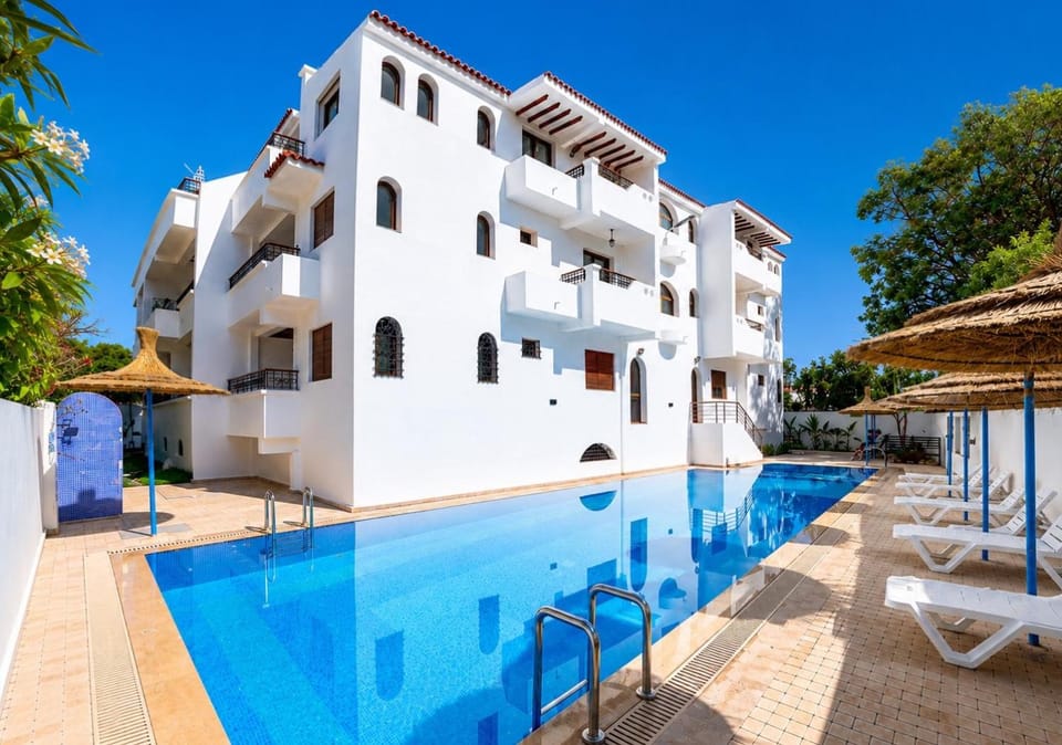 Property building, Day, View (from property/room), Swimming pool, sunbed