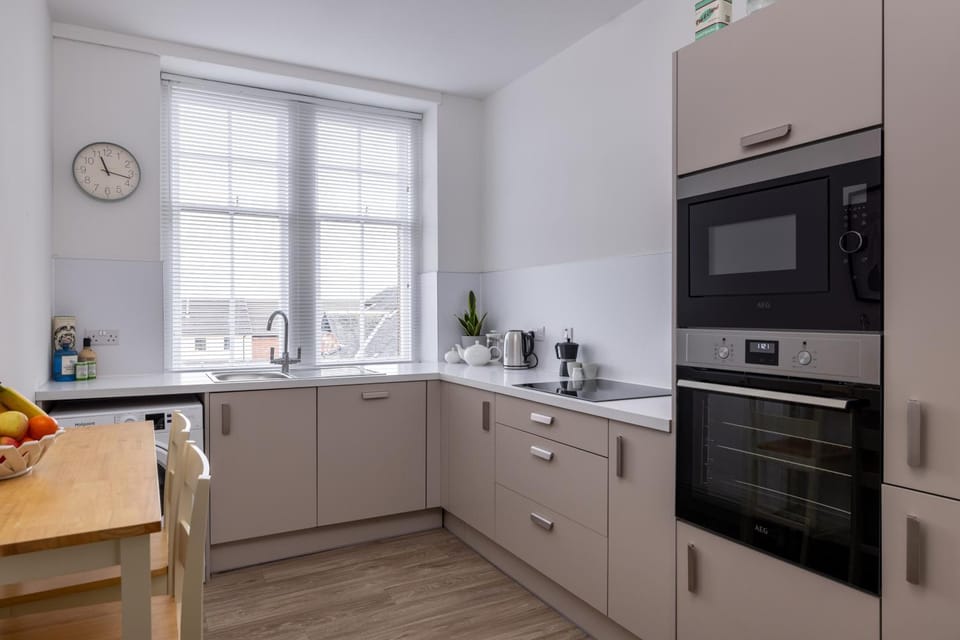 Kitchen or kitchenette, Dining area, dishwasher, oven, stove, toaster
