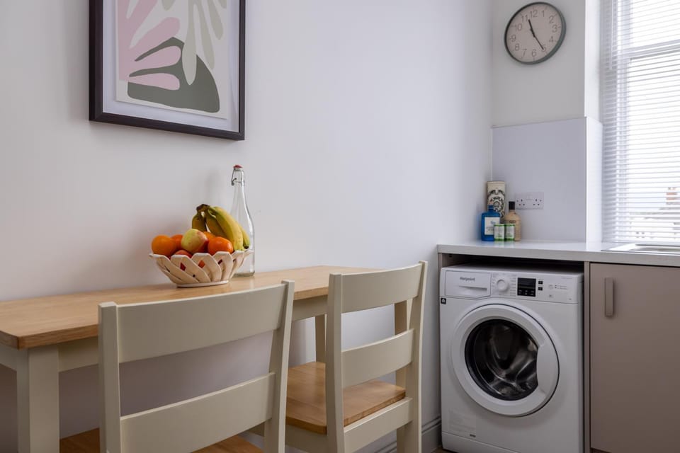 Kitchen or kitchenette, washing machine