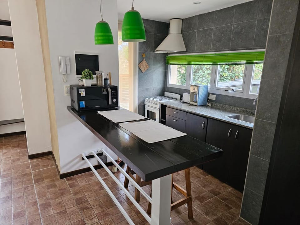 Kitchen or kitchenette, oven, stove
