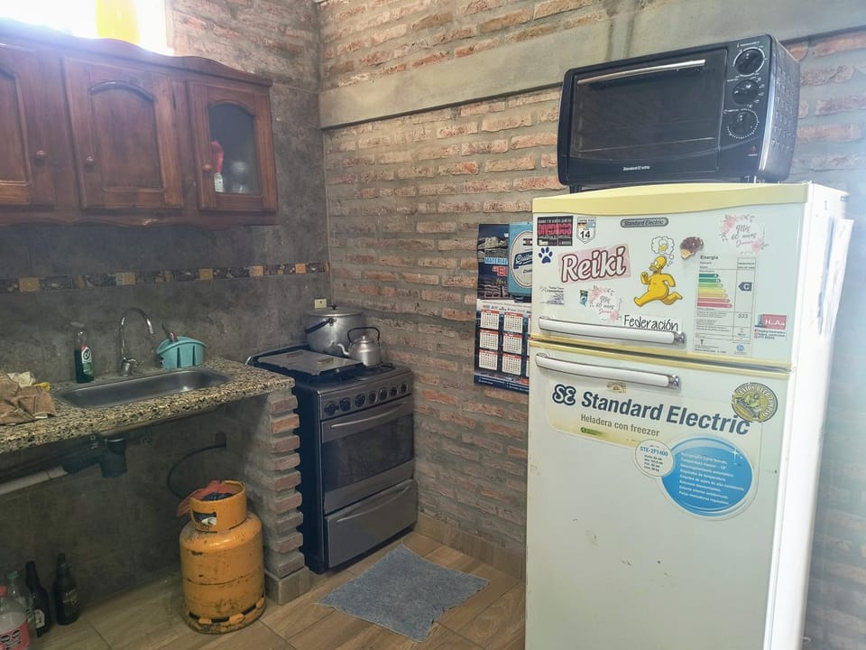 Kitchen or kitchenette, oven, stove