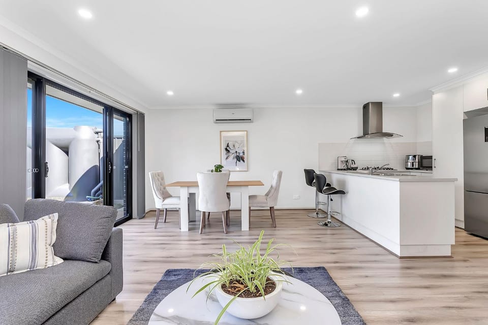 Kitchen or kitchenette, Living room, Seating area, Dining area, oven, stove, air conditioner