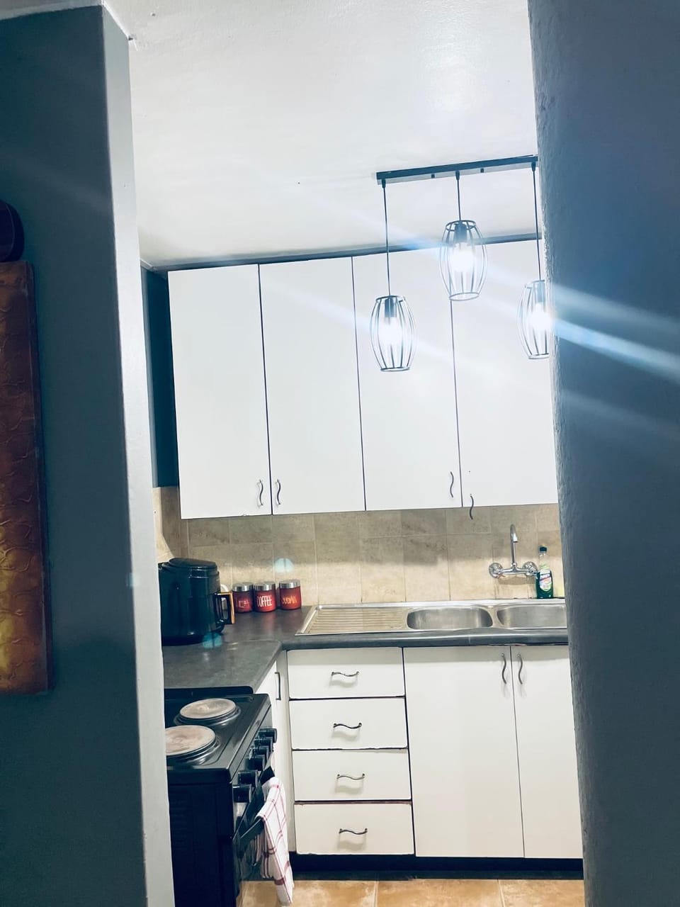 Kitchen or kitchenette, stove