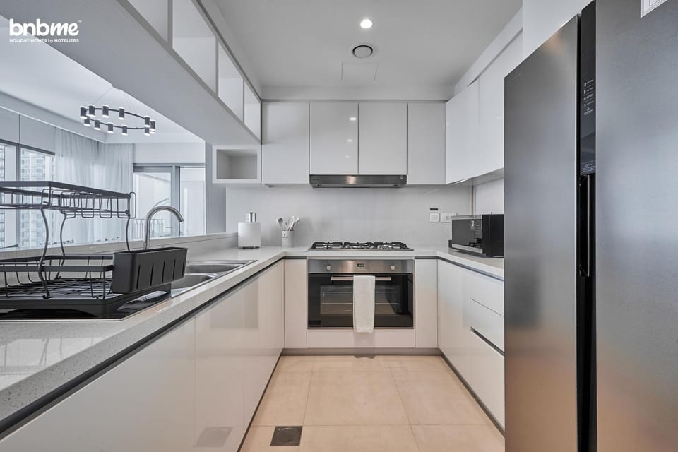 Kitchen or kitchenette, dishwasher, oven, stove, toaster