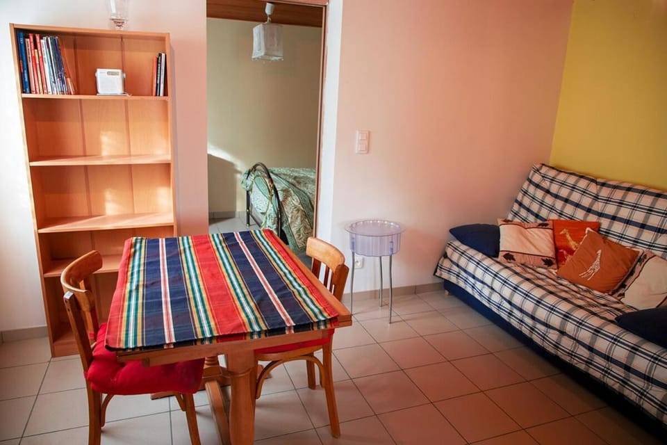 Bed, Library, Living room, Seating area
