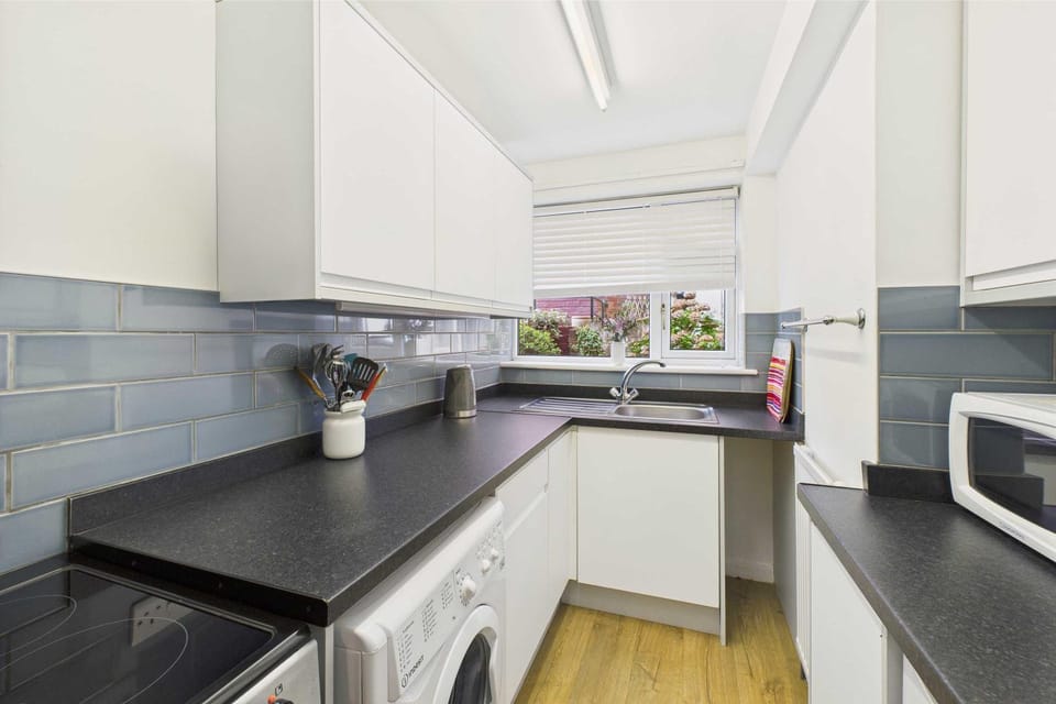Kitchen or kitchenette, oven, stove, toaster