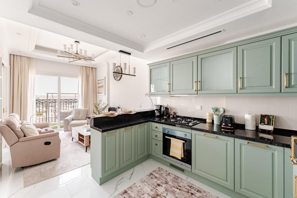 Coffee/tea facilities, Kitchen or kitchenette, Living room, Dining area, stove, toaster
