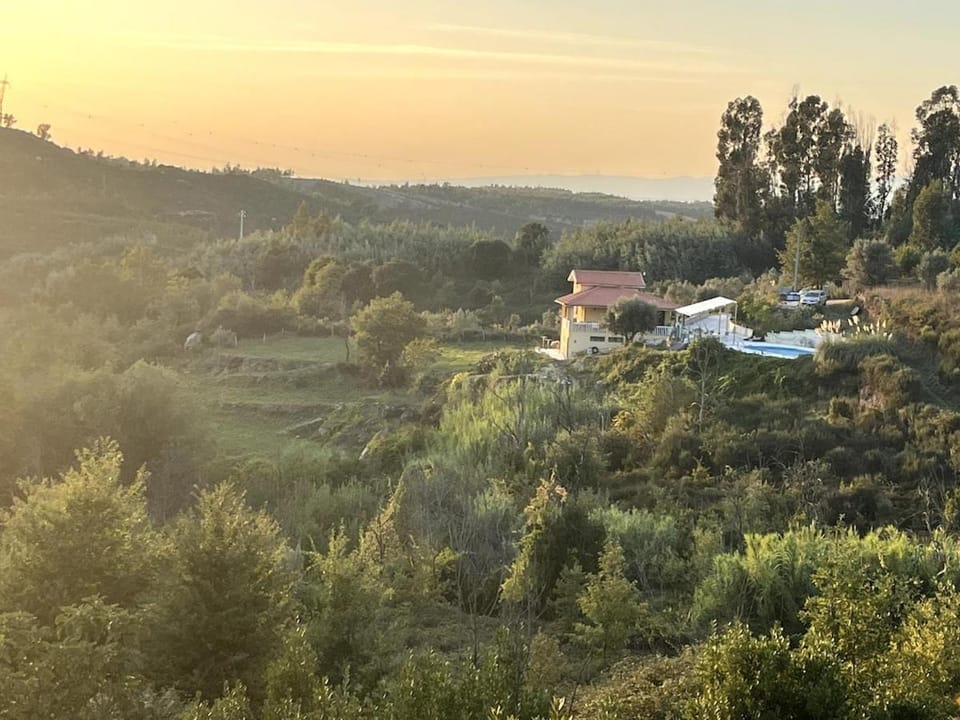 Property building, Nearby landmark, Natural landscape, Bird's eye view, Mountain view, Pool view, Swimming pool, Sunset