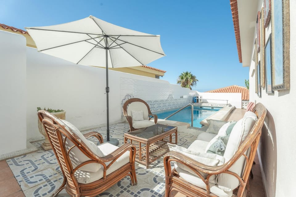 Property building, Living room, Swimming pool
