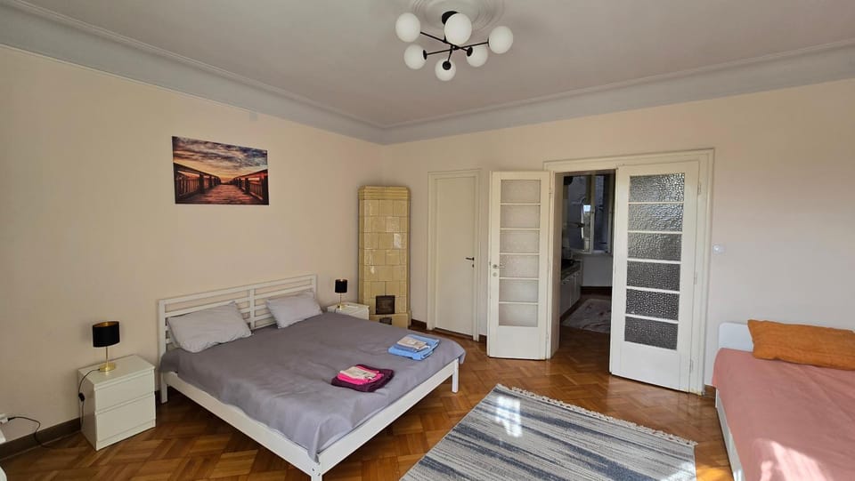 Bed, Photo of the whole room, Bedroom, fireplace, towels, wardrobe