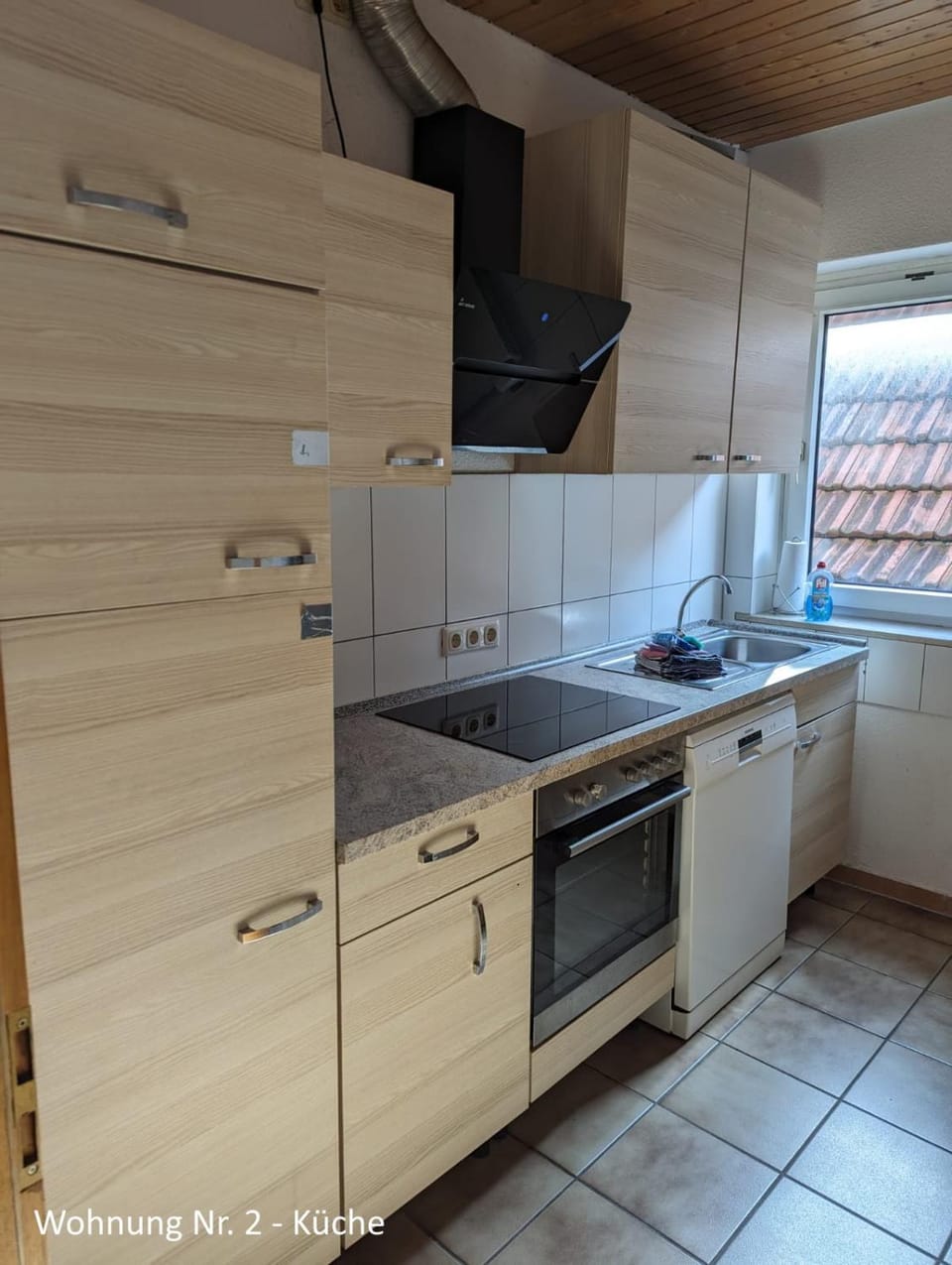 Kitchen or kitchenette, dishwasher, stove