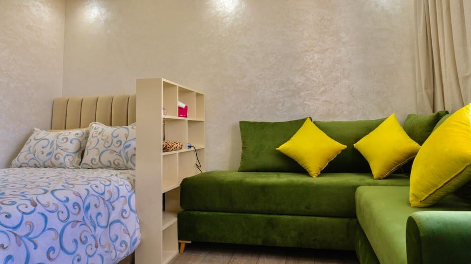 Bed, Living room, Seating area, Bedroom