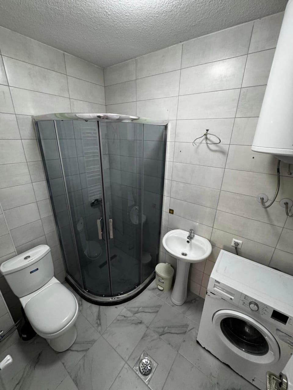 Shower, Toilet, Bathroom, bidet, towels, washing machine, dryer