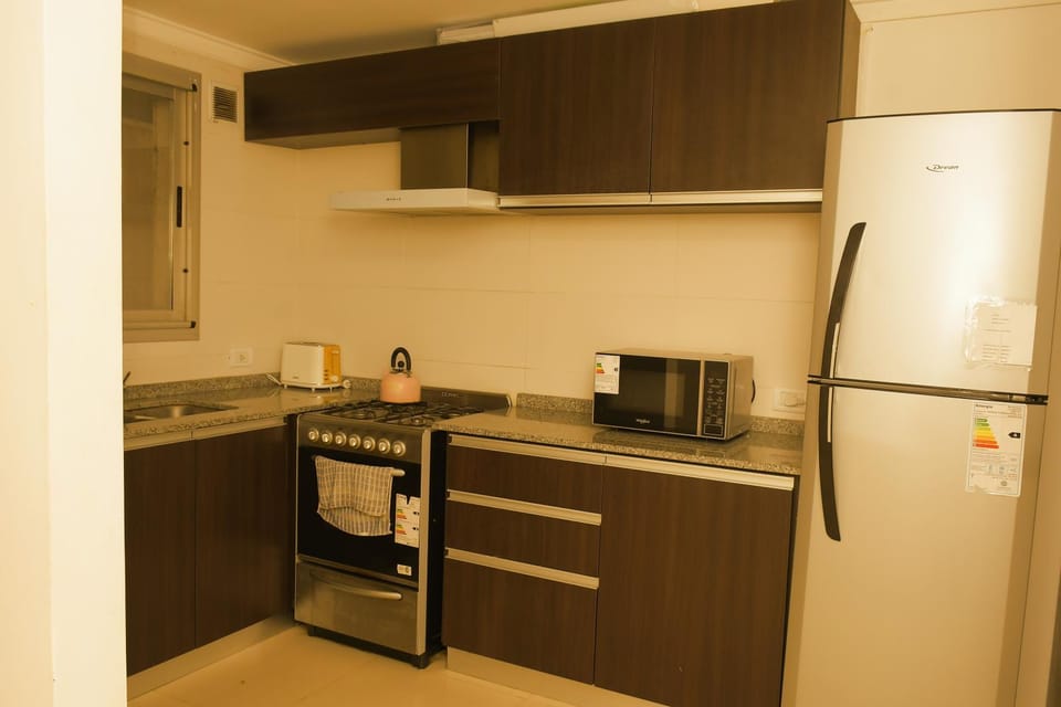 Kitchen or kitchenette, oven, kitchen