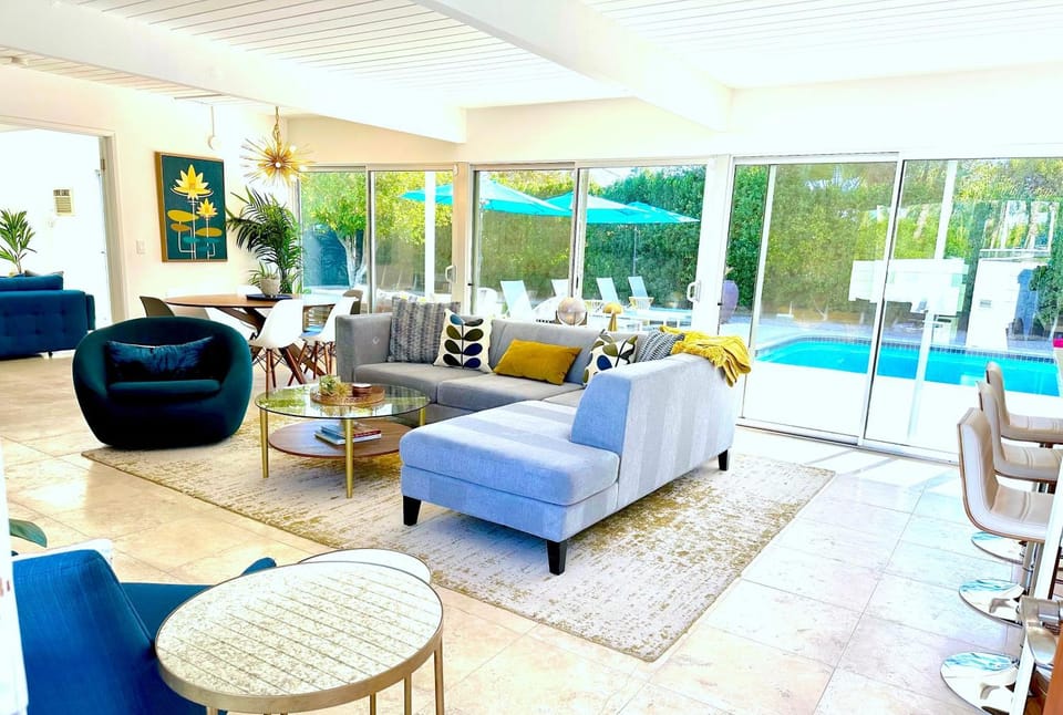 Living room, Seating area, Pool view