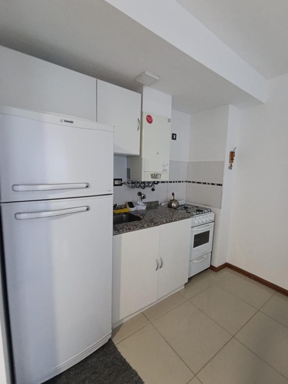 Kitchen or kitchenette, oven, stove