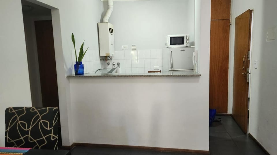 Kitchen or kitchenette, oven