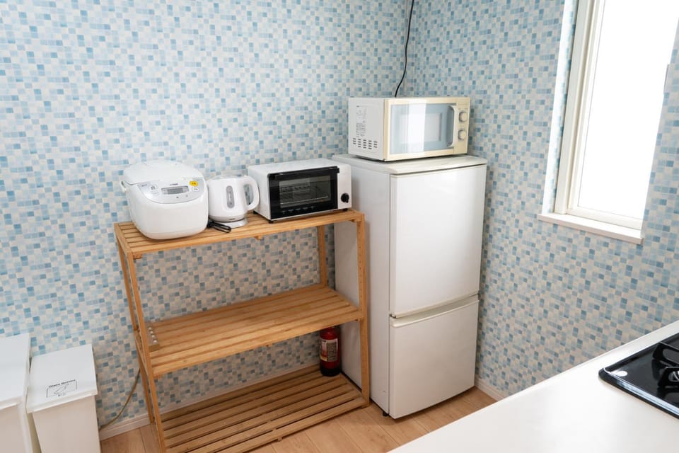 古宇利島まで車で10分の星降るやんばるテラス海まで徒歩3分のは1棟貸 Apartment in Okinawa Prefecture