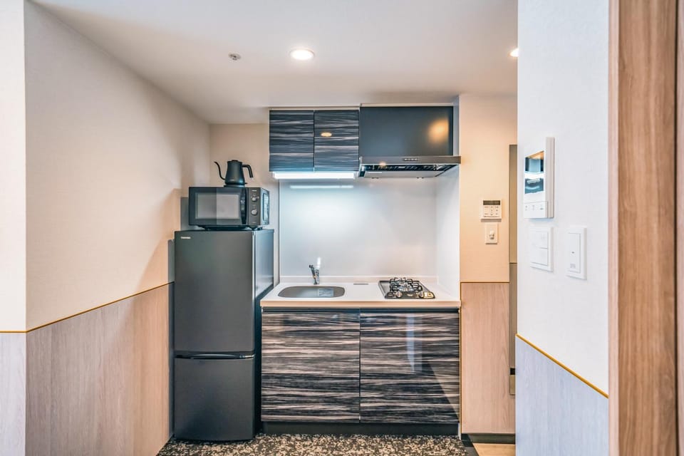 Kitchen or kitchenette, stove