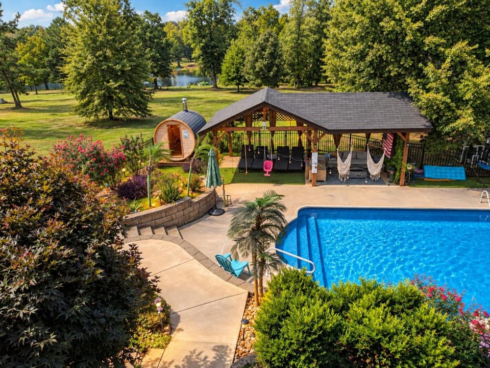 Patio, Natural landscape, Garden, Sauna, Seating area, Swimming pool