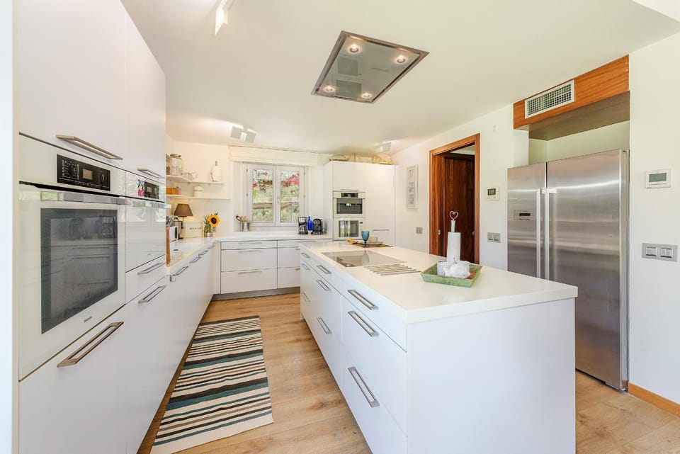 Kitchen or kitchenette, dishwasher, oven, stove, toaster