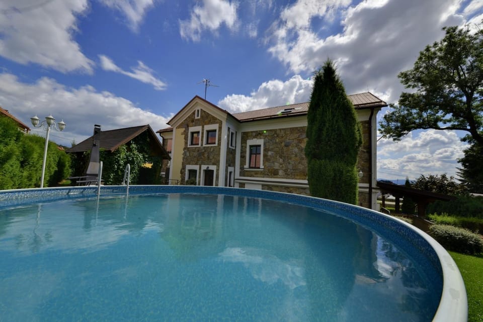 Property building, Seating area, Swimming pool