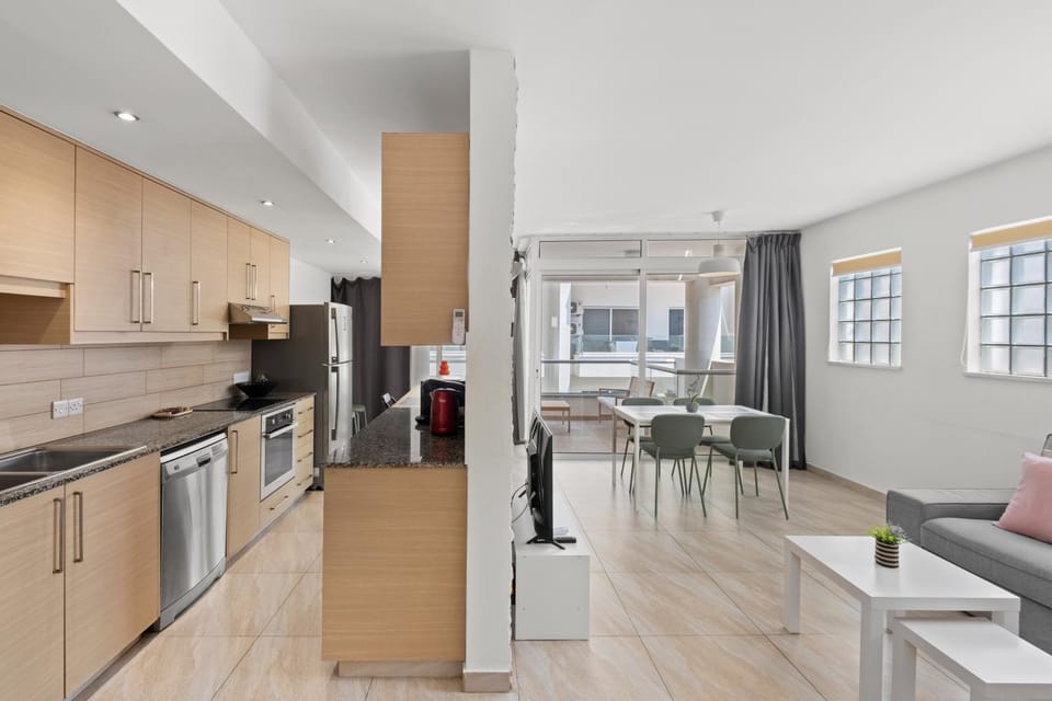 Kitchen or kitchenette, Living room, Dining area, dishwasher, oven, stove, toaster