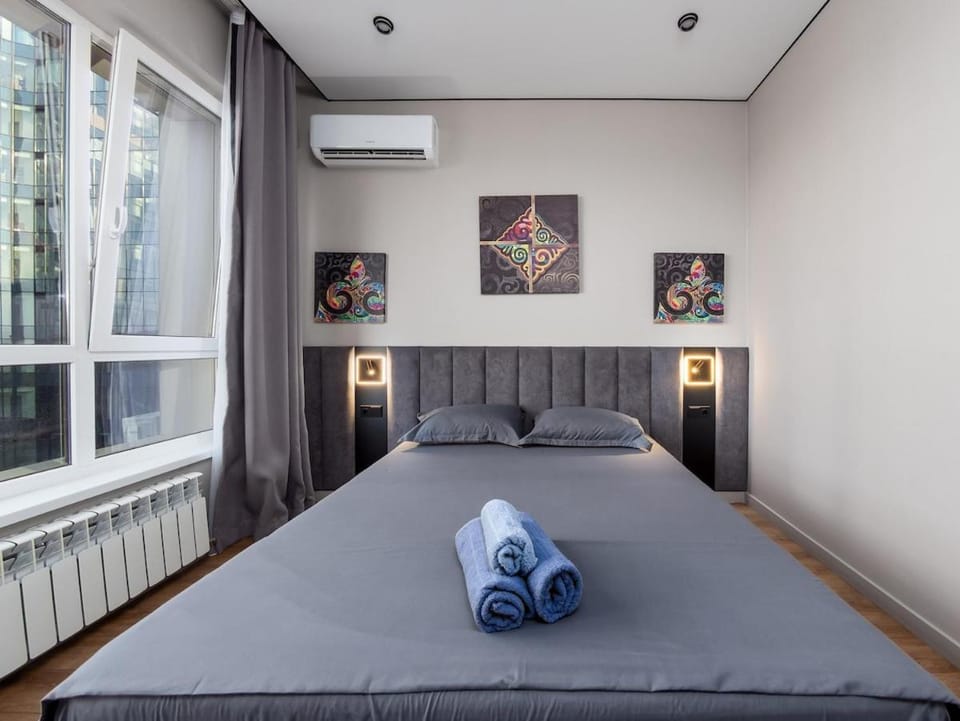 Апартаменты с двумя спальнями Apartment in Almaty