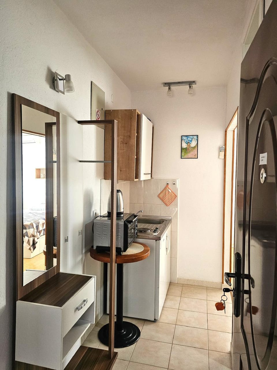 Kitchen or kitchenette, oven