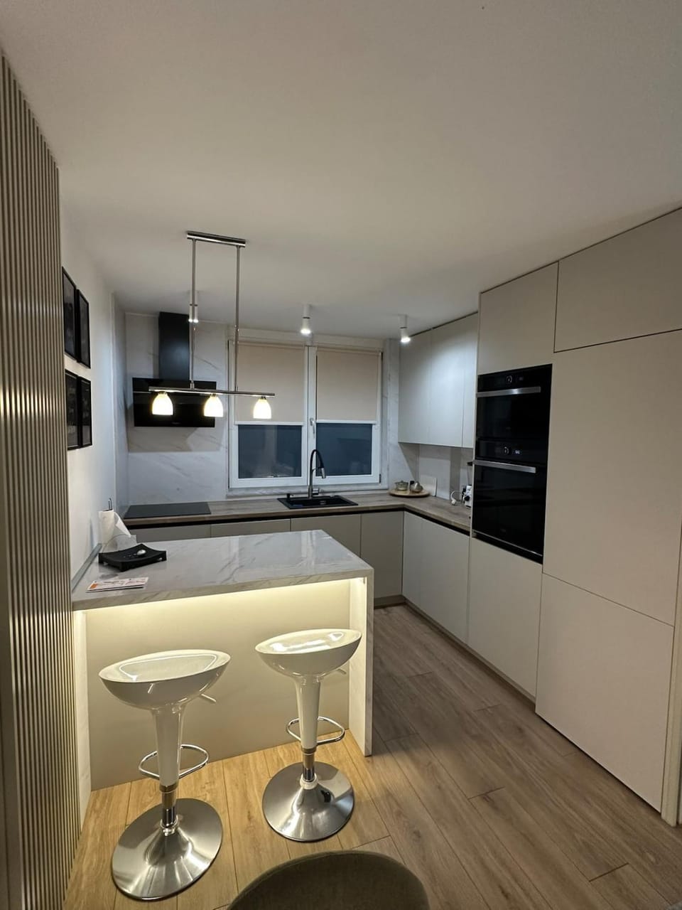 Kitchen or kitchenette, dishwasher, oven, stove