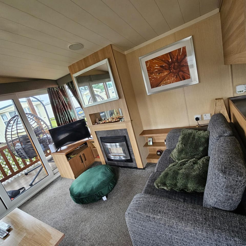 Rhyl Caravan with Veranda Egg Chairs & Garden House in Rhyl