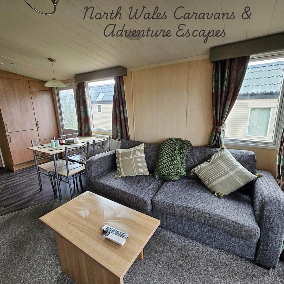 Rhyl Caravan with Veranda Egg Chairs & Garden House in Rhyl