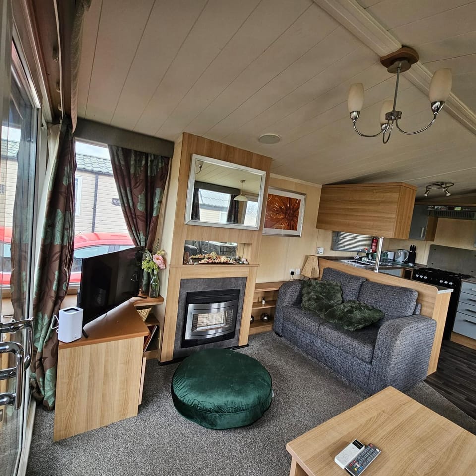 Rhyl Caravan with Veranda Egg Chairs & Garden House in Rhyl