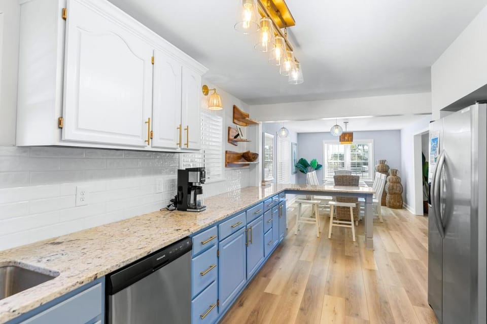 Kitchen or kitchenette, dishwasher, oven, stove, toaster