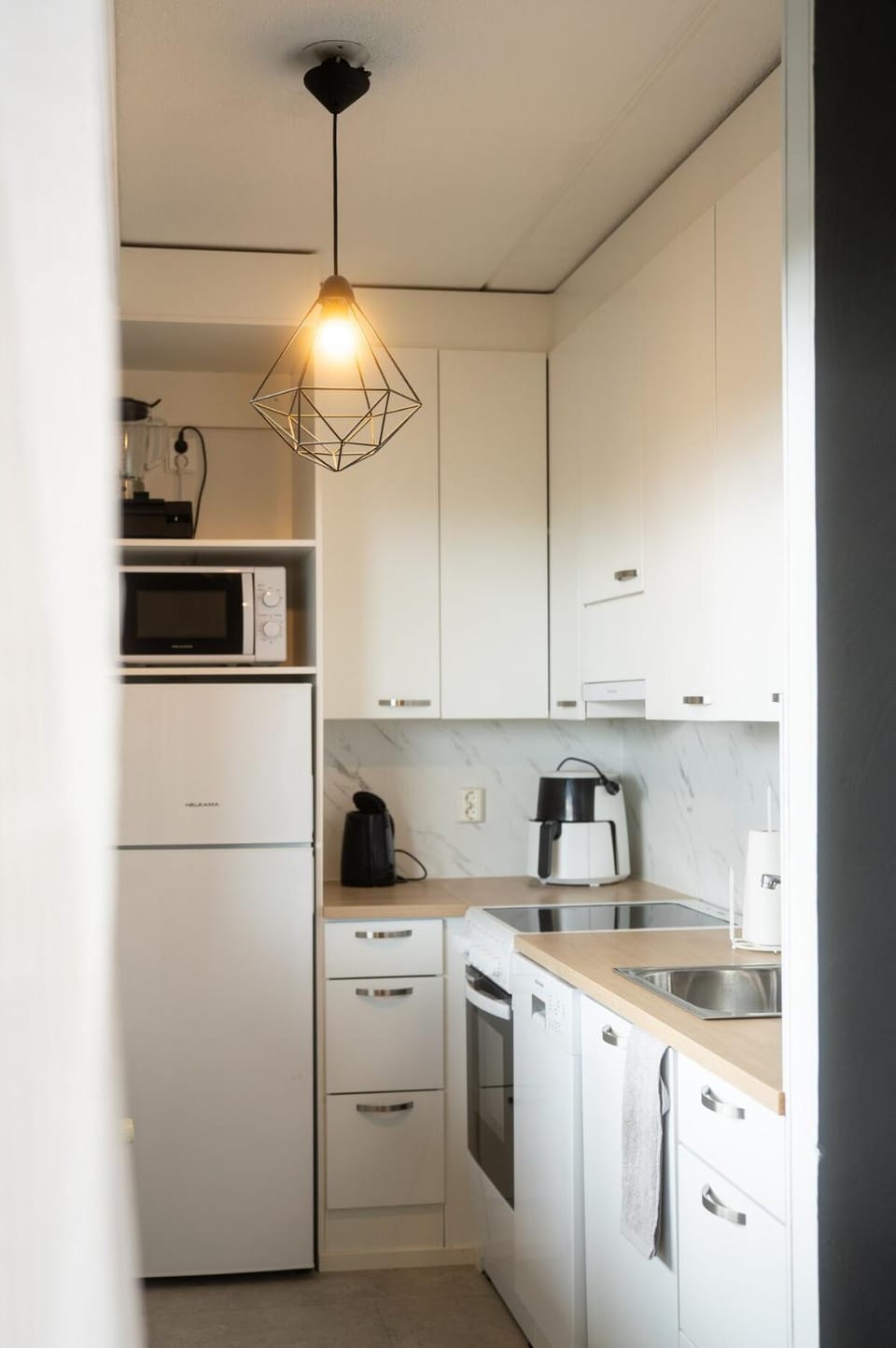 Kitchen or kitchenette, dishwasher, oven, stove