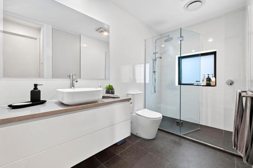 Shower, Toilet, Bathroom, hair dryier, washing machine, dryer