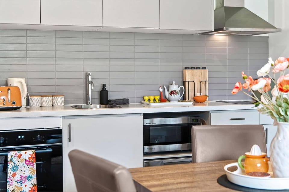 Coffee/tea facilities, dishwasher, flat iron, microwave, oven, stove, stove, toaster, kitchen