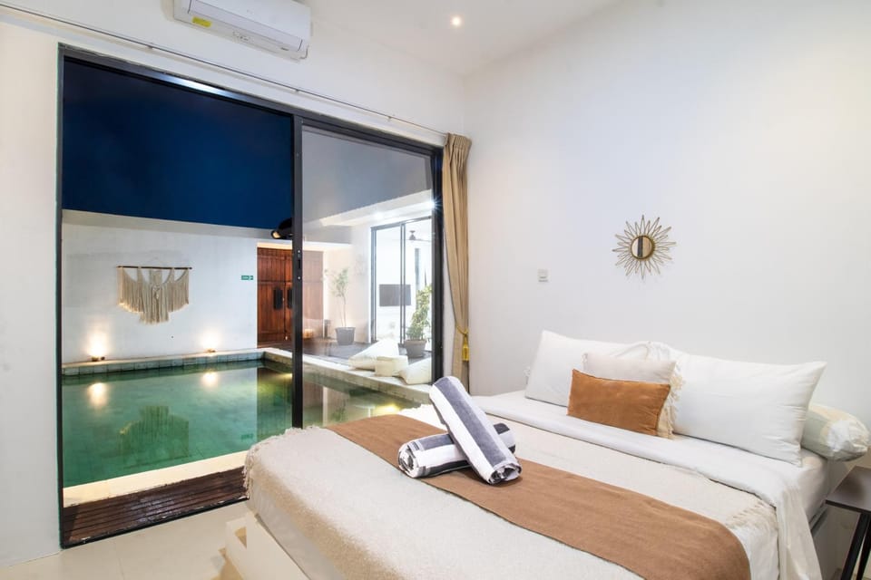 Bed, Bedroom, Pool view, towels, air conditioner