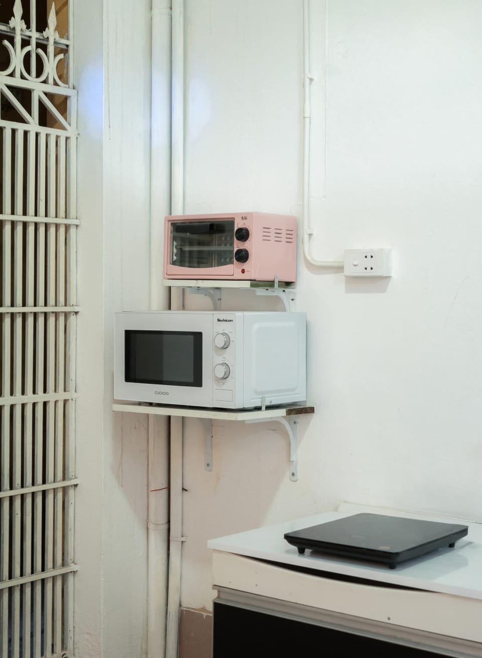 Kitchen or kitchenette, microwave