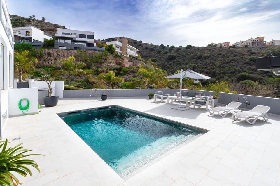 Property building, Living room, Swimming pool